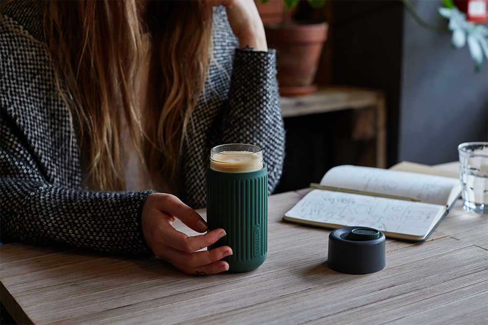 A glass travel cup helps keep the taste of the coffee